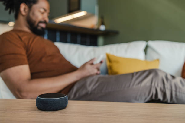 istock Smart speaker on the table in the living room. 1393445490