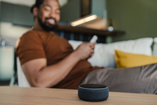 istock Smart speaker on the table in the living room. 1393445673