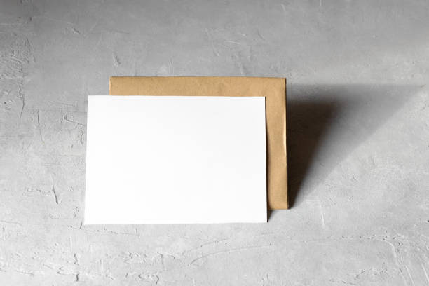 istock Wedding stationery invitation card mockup 5x7 on neutral grey background with envelop 1393448515