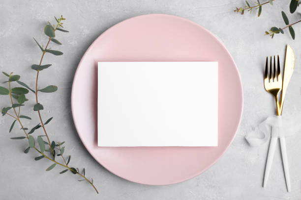 istock Wedding stationery invitation card mockup 7x5 on grey background with eucalyptus, Menu card mockup with table setting 1393448539