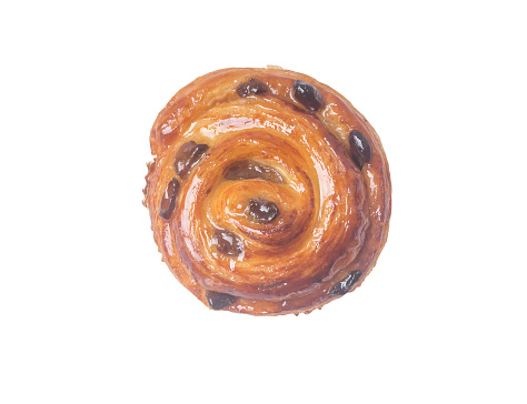 Top view of spiral danish pastry or sweet bun is isolated on white background with clipping path.