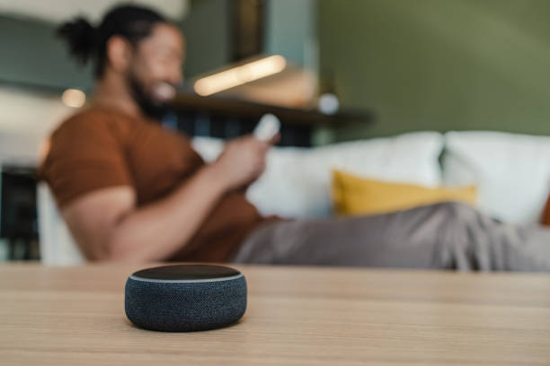 istock Smart speaker on the table in the living room 1393454816