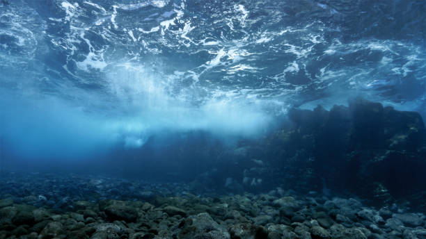 istock Rays of sunlight over the reef 1393463615