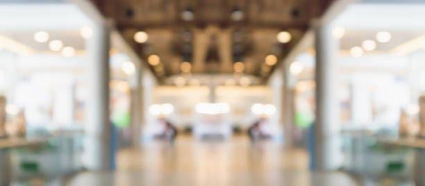 istock Abstract blur modern shopping mall interior background 1393465631