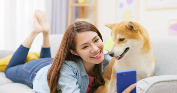 istock girl and dog selfie 1393472922