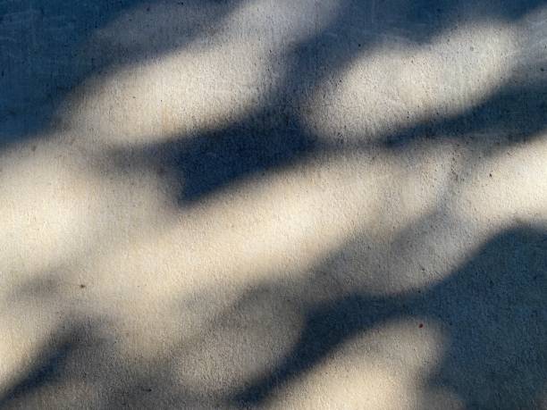 istock Blurred circle lights on grunge wall background. 1393473581