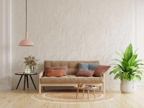 istock White plaster wall living room have brown sofa and decoration. 1393474545