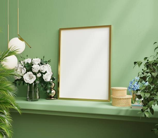 istock Mock up gold frame on the green shelf with beautiful plants. 1393474605