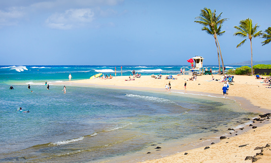 The popular Poipu Beach on the south shore of the island of Kauai, Hawaii