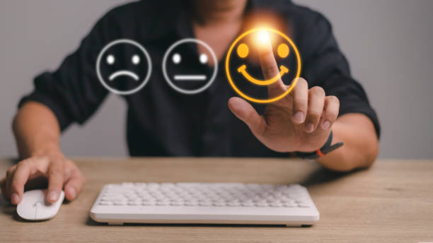 istock Businessman pressing smiley face emoticon on virtual touch screen. Customer service evaluation concept. 1393485951