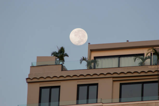 istock full moon setting Rio de Janeiro, Brazil. 1393488336