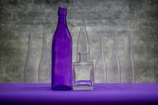 Still life with glassware on a purple table