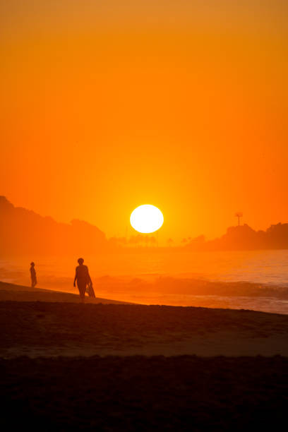 istock sunrise at ipanema beach in Rio de Janeiro. 1393489028