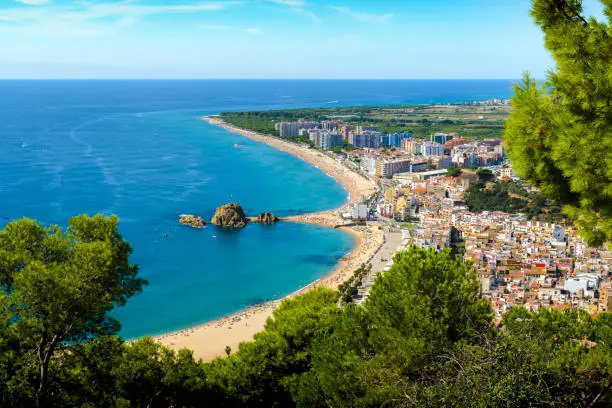 Photo of Beach and coast of Blanes city seen from Castell Sant Joan in Spain