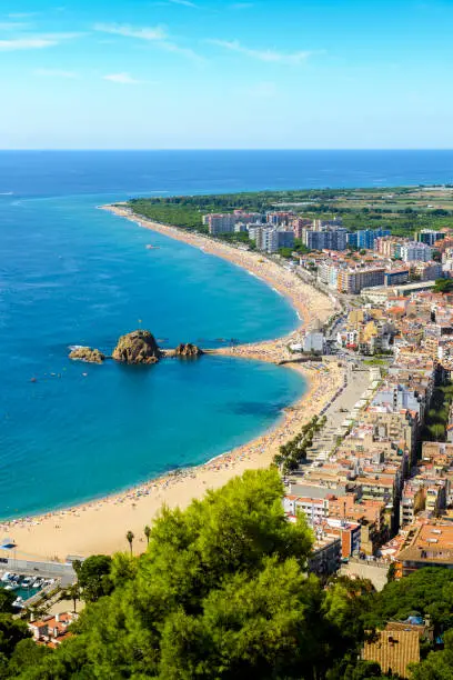 Photo of Beach and coast of Blanes city seen from Castell Sant Joan in Spain