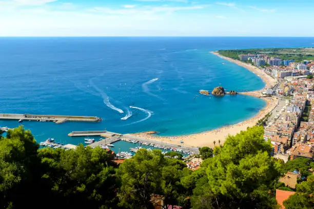 Photo of Beach and coast of Blanes city seen from Castell Sant Joan in Spain