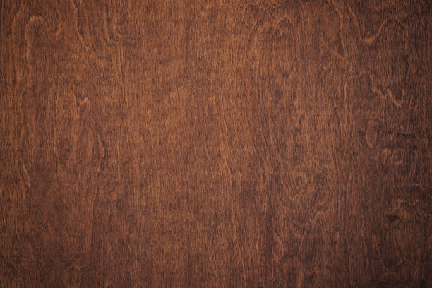istock brown boards as a template for design. dark wood texture backdrop 1393493957
