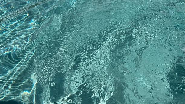 istock Beautiful colored swimming pool water 1393495822
