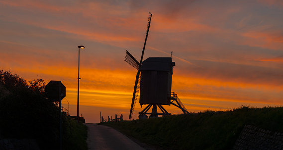 The sun sets on Pitstone Windmill in Buckinghamshire, south east England.