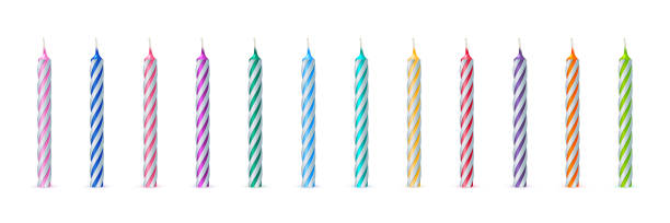 istock Row of striped swirl candles with different colors, 3d decoration for anniversary cake 1393498639