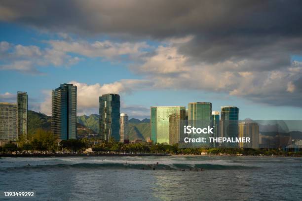 People Surfing In Oahu Hawaii Stock Photo - Download Image Now - Beach, Building Exterior, Hawaiian Culture