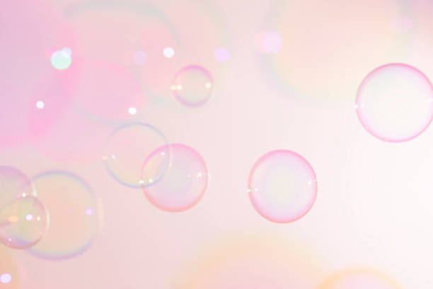 istock Beautiful Pink Colorful Soap Bubbles Background. Soap Suds Bubbles Water 1393502455