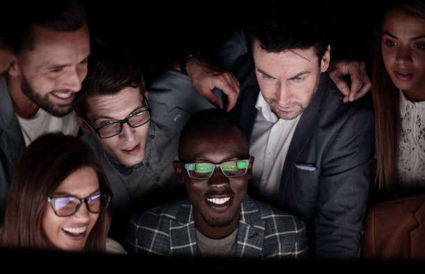 istock close up.a successful business team looks at the computer screen with passion 1393507887