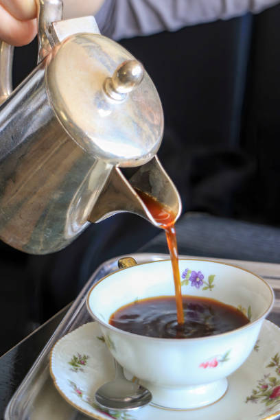 istock Pouring mocca coffee in a porcelain cup 1393507914