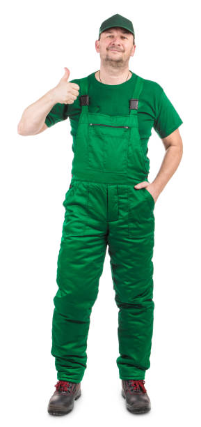 istock A worker in a green jumpsuit gives a thumbs up. 1393508366