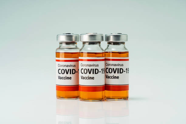 istock Covid 19 coronavirus vaccine in glass flask for immunity 1393509476