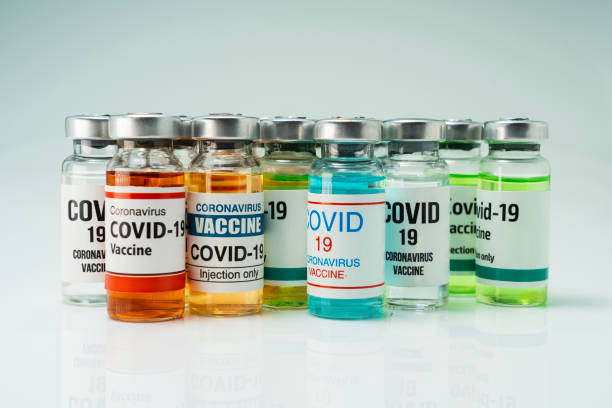 istock Covid 19 coronavirus vaccine in glass flask for immunity 1393509509