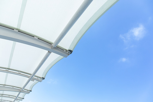White awning with blue sky