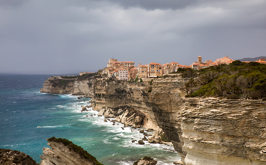 The dramatic cliff with the Old City of Bonifacio on the Southern tip of Corsica, France