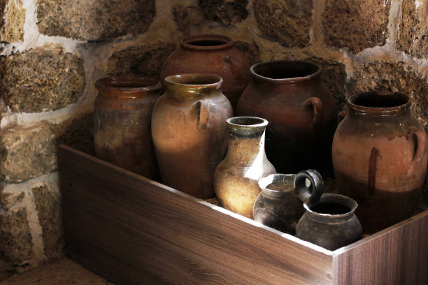 istock Old jugs. Jugs of various sizes. Historical things 1393517177