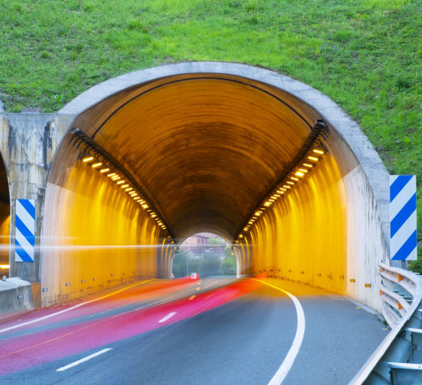 istock car driving at high speed through a tunnel 1393517297