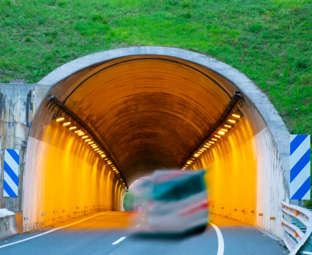 istock car driving at high speed through a tunnel 1393517378