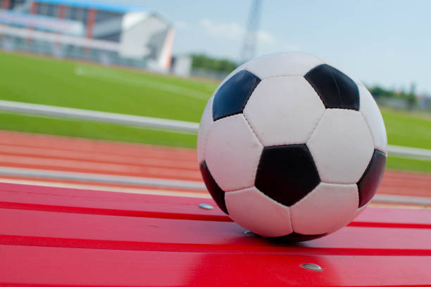 istock soccer ball on stadium 1393522562