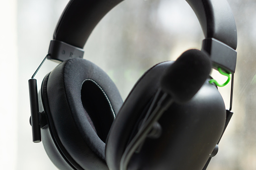 Wired headphones on white background