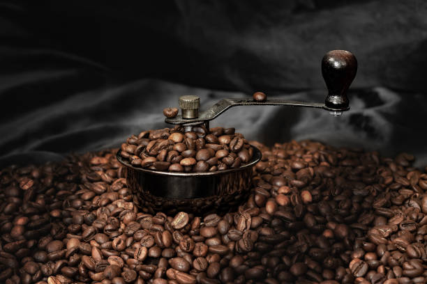 istock Manual coffee grinder mill with coffee beans 1393528060