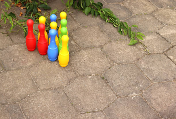 istock Playing activity outdoors. treet bowling. Set of pines 1393531908