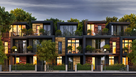 Evening view of the townhouse in a modern style