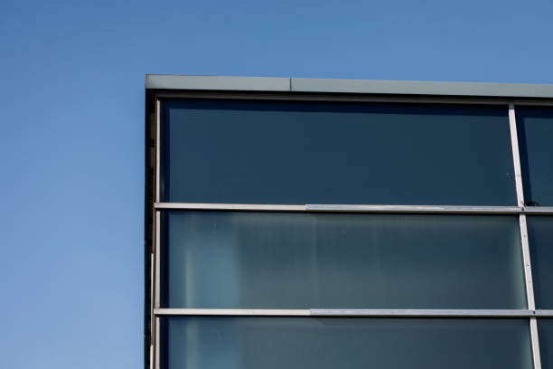 istock Business glass building and blue sky. 1393539165