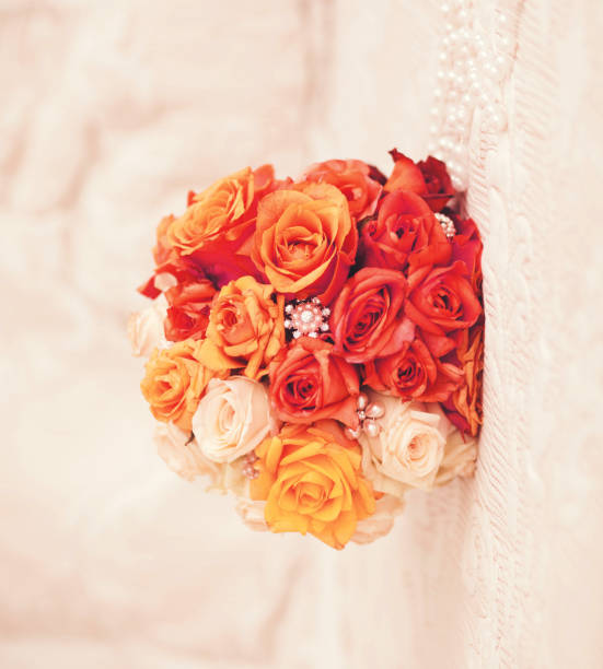 wedding bouquet with roses and beads. decorative flowers