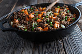 Pan fried ground beef with peas and carrots