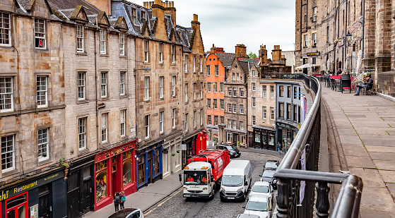 Edinburgh, Scotland - 2 October, 2021: West Bow and Victoria street in Edinburgh old town, most popular touristic streets in Edinburg