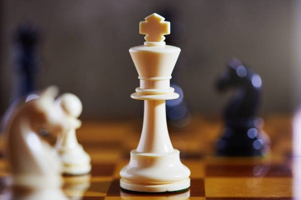istock White king central and in a chess game 1393549420