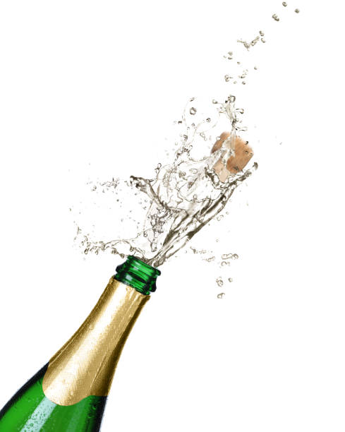 istock Sparkling wine splashing out of bottle on white background 1393550738