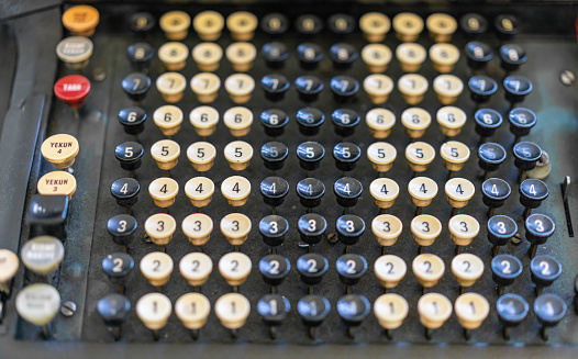 top down view on old vintage typewriter keyboard on wooden table