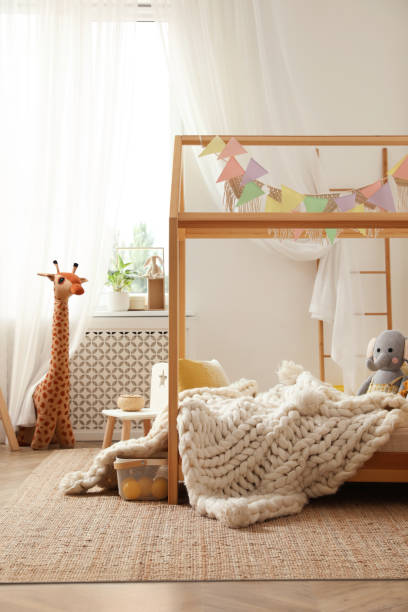 istock Stylish child room interior with house bed 1393555412