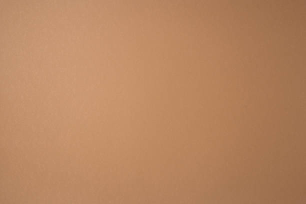 istock Empty light brown sand beige cardboard background. Background texture of cardboard 1393557091